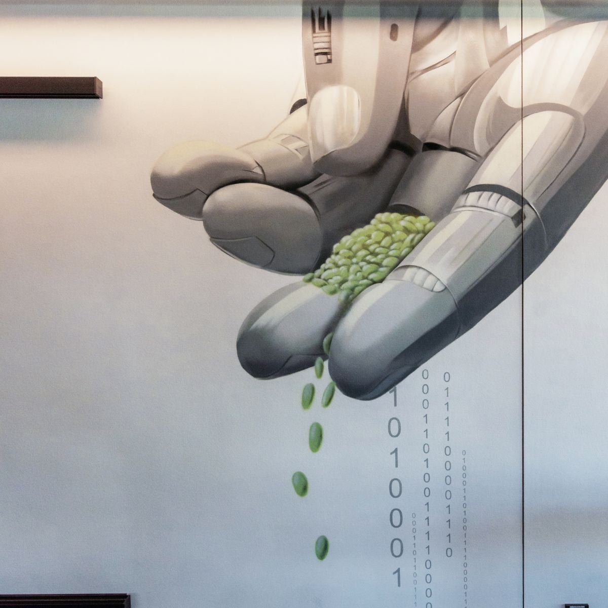 Graffiti an der Wand im Buero der Lise GmbH, Hand verstreut Samen